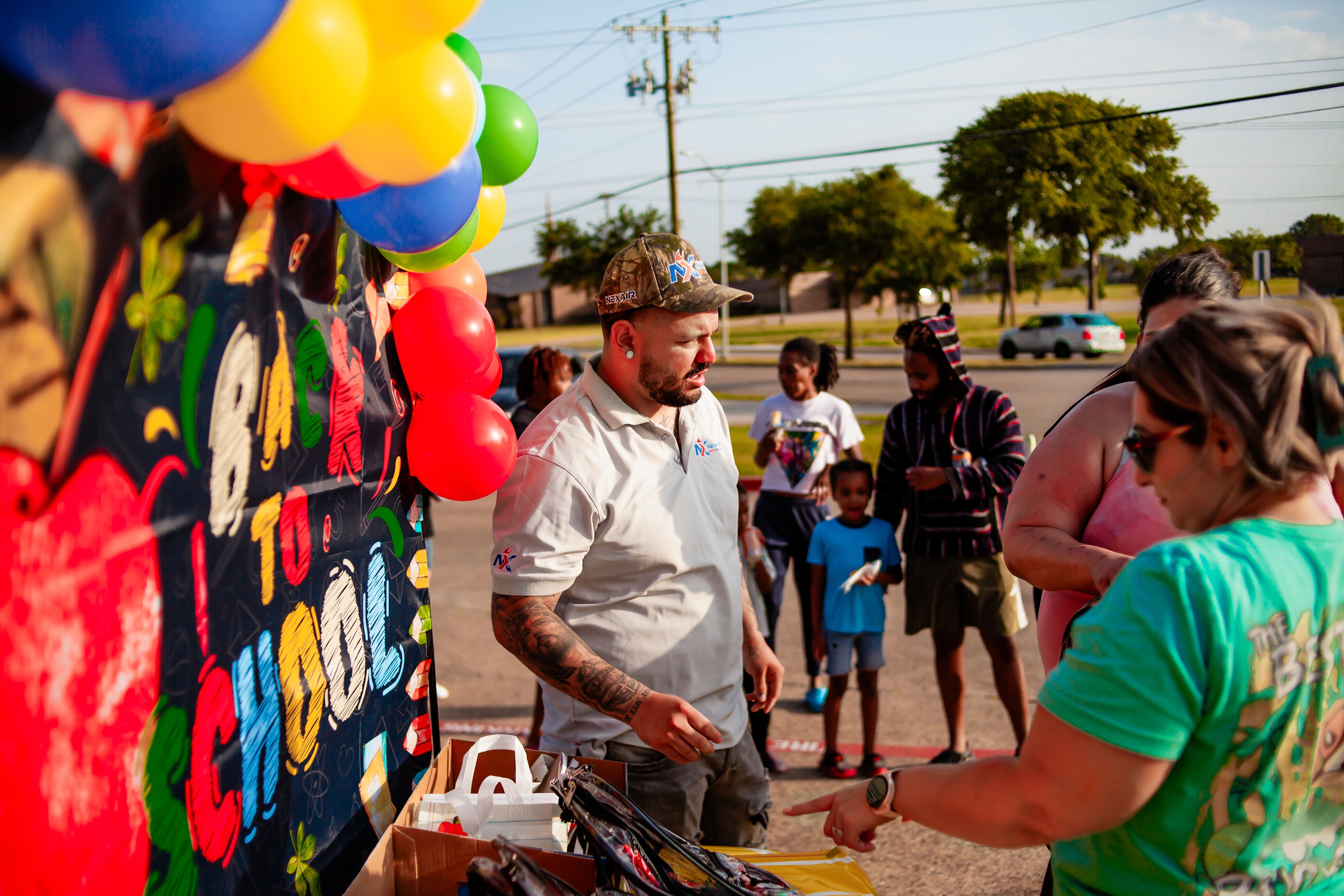 NexAir team member at the back-to-school supply drive