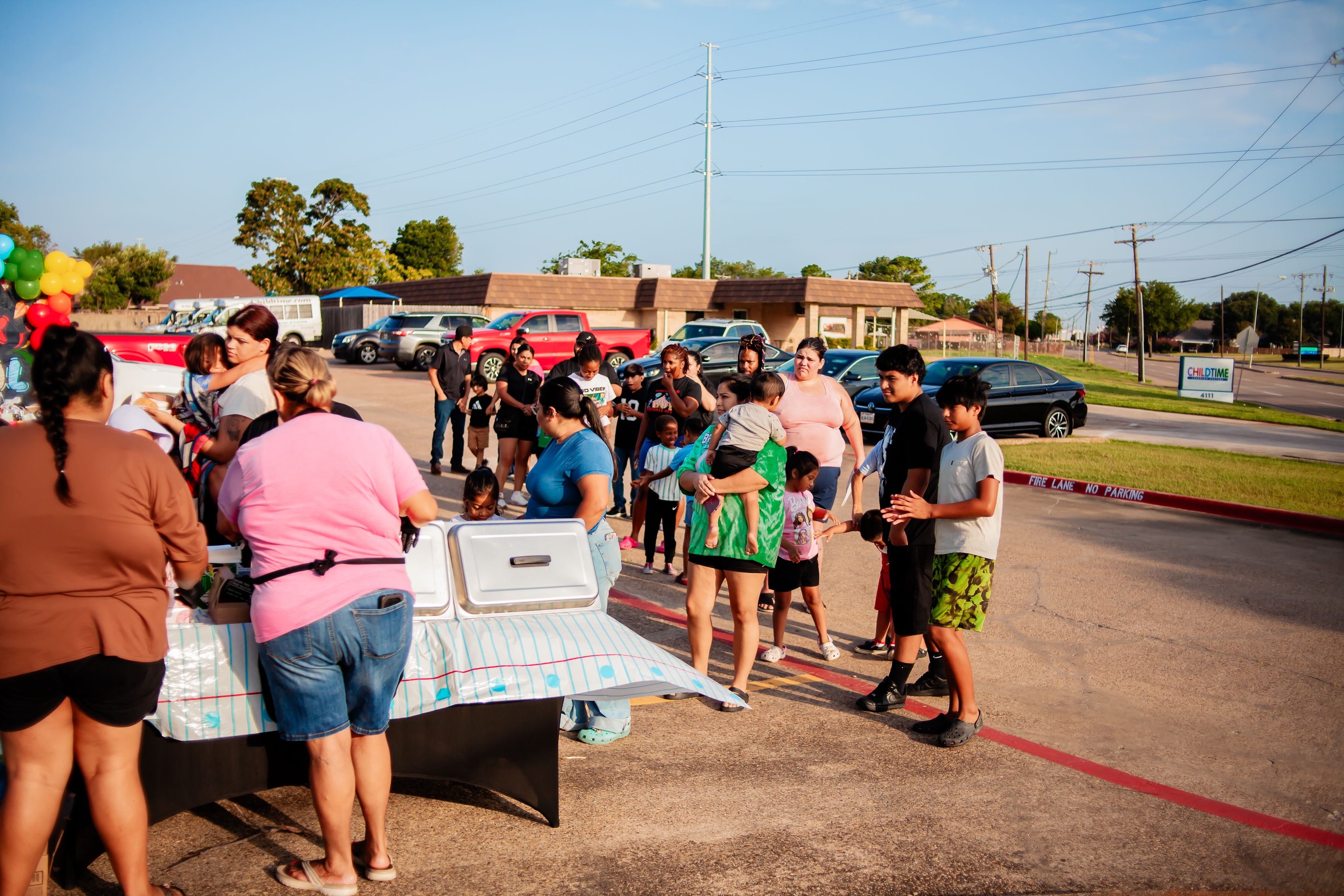 DFW families picking up school supplies at the NexAir drive